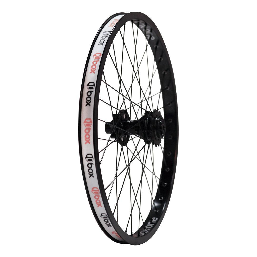 The Box Three Pro Disc Rear Wheel 20x1.75" - 10mm features black spokes, a white rim with red and black "Box" logos, and a reliable Pro Disc hub—perfect for upgrading your BMX ride.