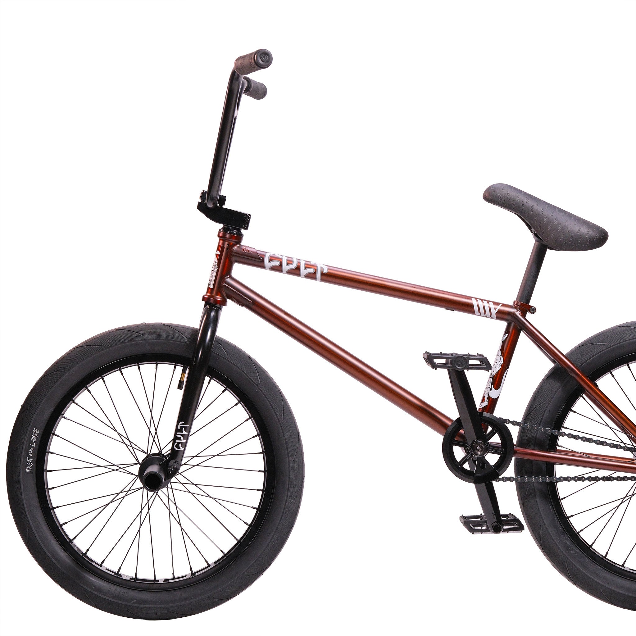 The Cult Dak X Eclat Custom 'Pat Freyne Signature' BMX bike is shown from the side against a white background, featuring a brown frame, black wheels and seat, raised handlebars, and no visible brakes.
