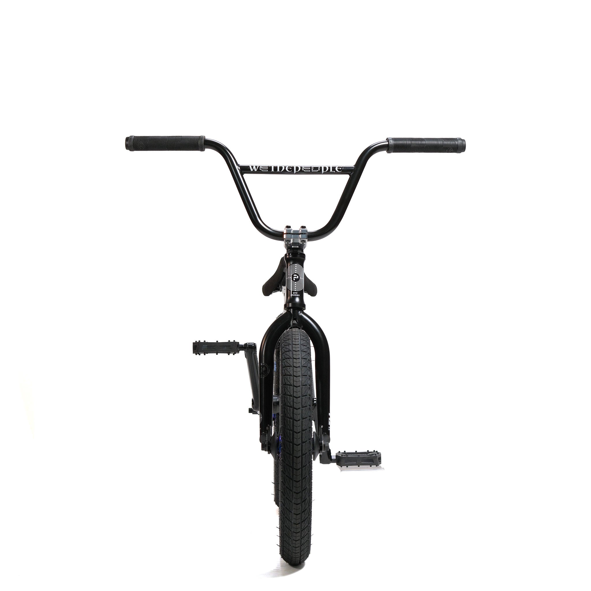 The Wethepeople Prodi-G-Unit 18 Inch Custom Bike is photographed from the front against a white background, highlighting its handlebars, front tire, and pedals. This model features premium Eclat parts for enhanced performance and durability.