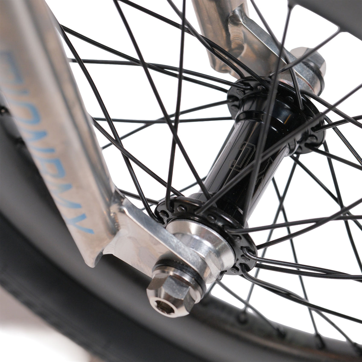 Close-up of the ION BMX Ti16 Custom Titanium 16 Inch Bike wheel, featuring a black hub, silver spokes, and metal fork against a white background. The lightweight titanium BMX design is evident in the meticulous detailing and sleek construction.