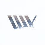 Metallic chrome lines create a stylized "W" on a white background in the LUXBMX Vinyl Transfer Sticker - Chrome, making it perfect as a modern bike sticker.