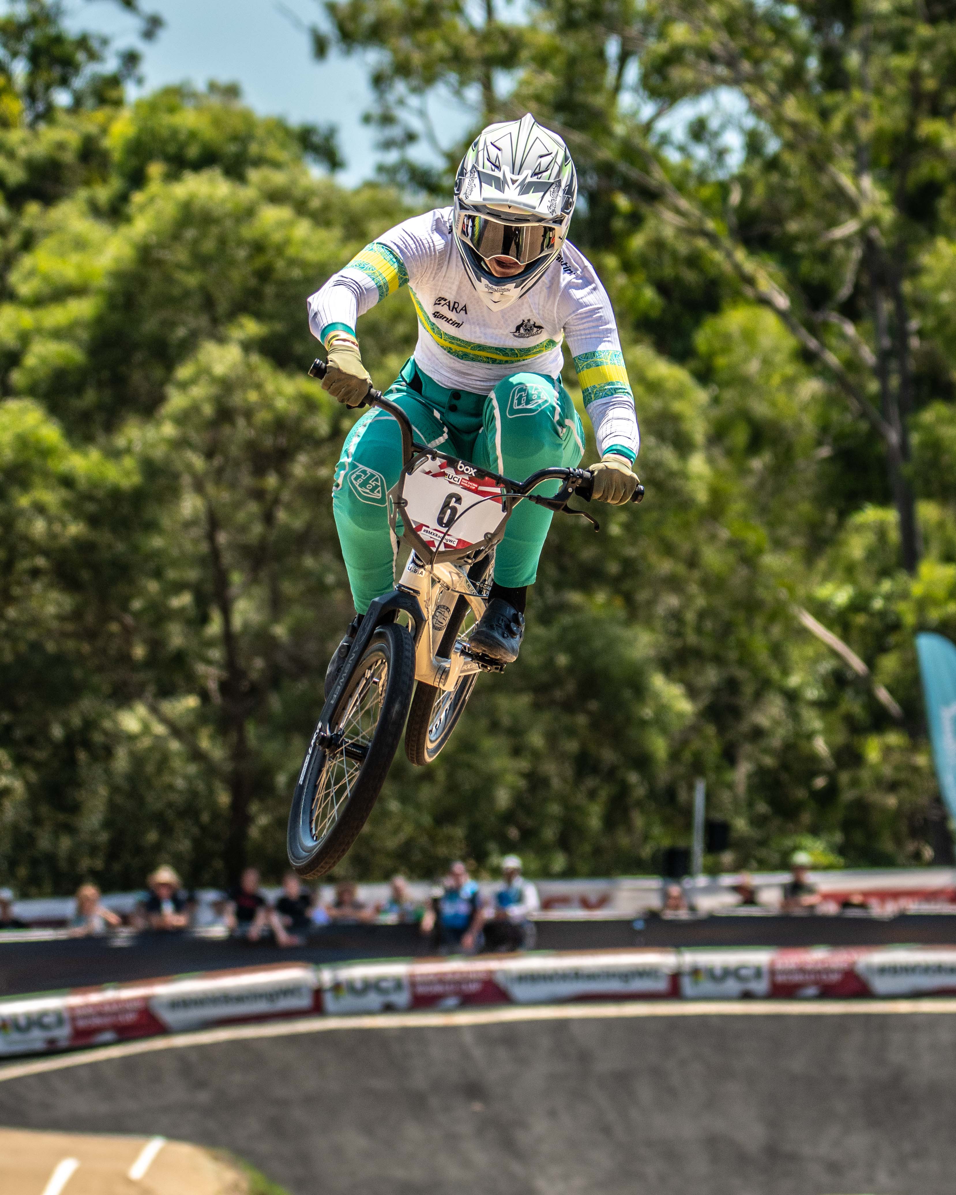 Capture epic race moments with the LUXBMX Race Photo Packages – Lake Macquarie National Series May 2025, featuring airborne riders in vibrant uniforms against scenic outdoor tracks and enthusiastic crowds.