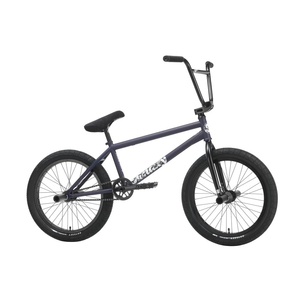 The Sunday Dark Wave Authentic 20 Inch Bike, showcasing a dark frame, black handlebars, and black tires with 100% aftermarket parts from the Broc Raiford Signature line, is displayed against a plain white background.