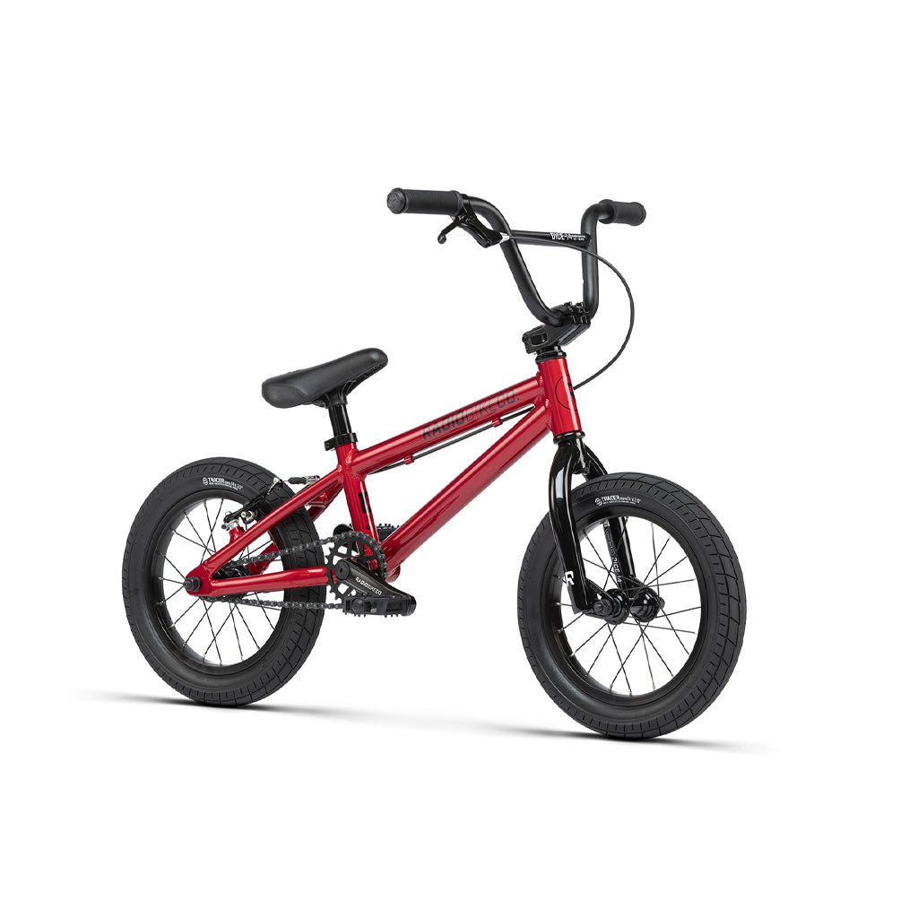 Red Radio Dice 14 Inch Bike with black tires and handlebars, positioned upright on a white background.