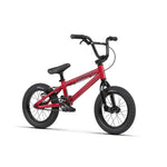 Red Radio Dice 14 Inch Bike with black tires and handlebars, positioned upright on a white background.