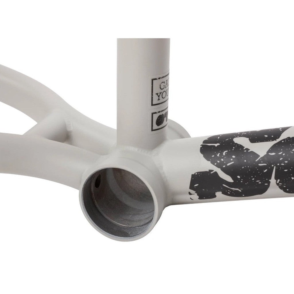 A close up of a bike frame featuring the Gary Young Signature Geometry and the logo of the Sunday Wavelength Frame brand.