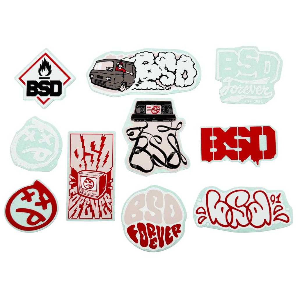 The BSD 2024 Sticker Pack (10 Pack) features ten vinyl stickers with assorted BSD designs, including text, a van, cassette tape, and bold red, black, and white graphics.