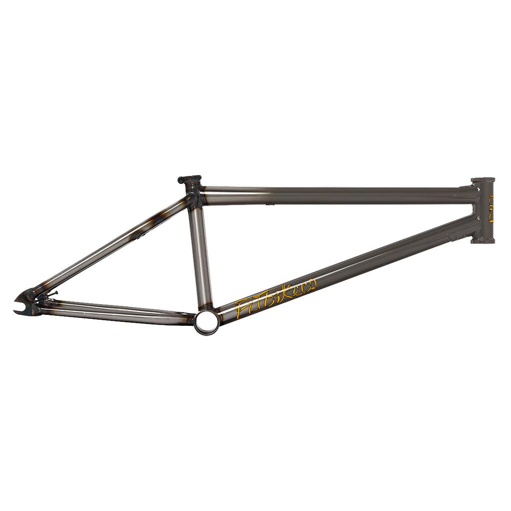 The Fit Bike Co Mixtape V2 Frame is a bare metal BMX frame built with the Thermal X tubeset, featuring a triangular structure and a yellow script logo, displayed from the side on a white background.