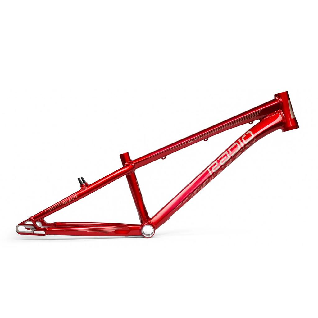 Radio Raceline Quartz 2025 Pro L Cruiser Frame in red with a Sliding Dropout Disc System, brand name on the lower tube, set against a white background.