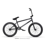 Black Wethepeople Trust 20 Inch Freecoaster/Hybrid Bike with thick tires, straight handlebars, and a padded seat on a white background. Ideal for street upgrades. Final product appearance may vary.