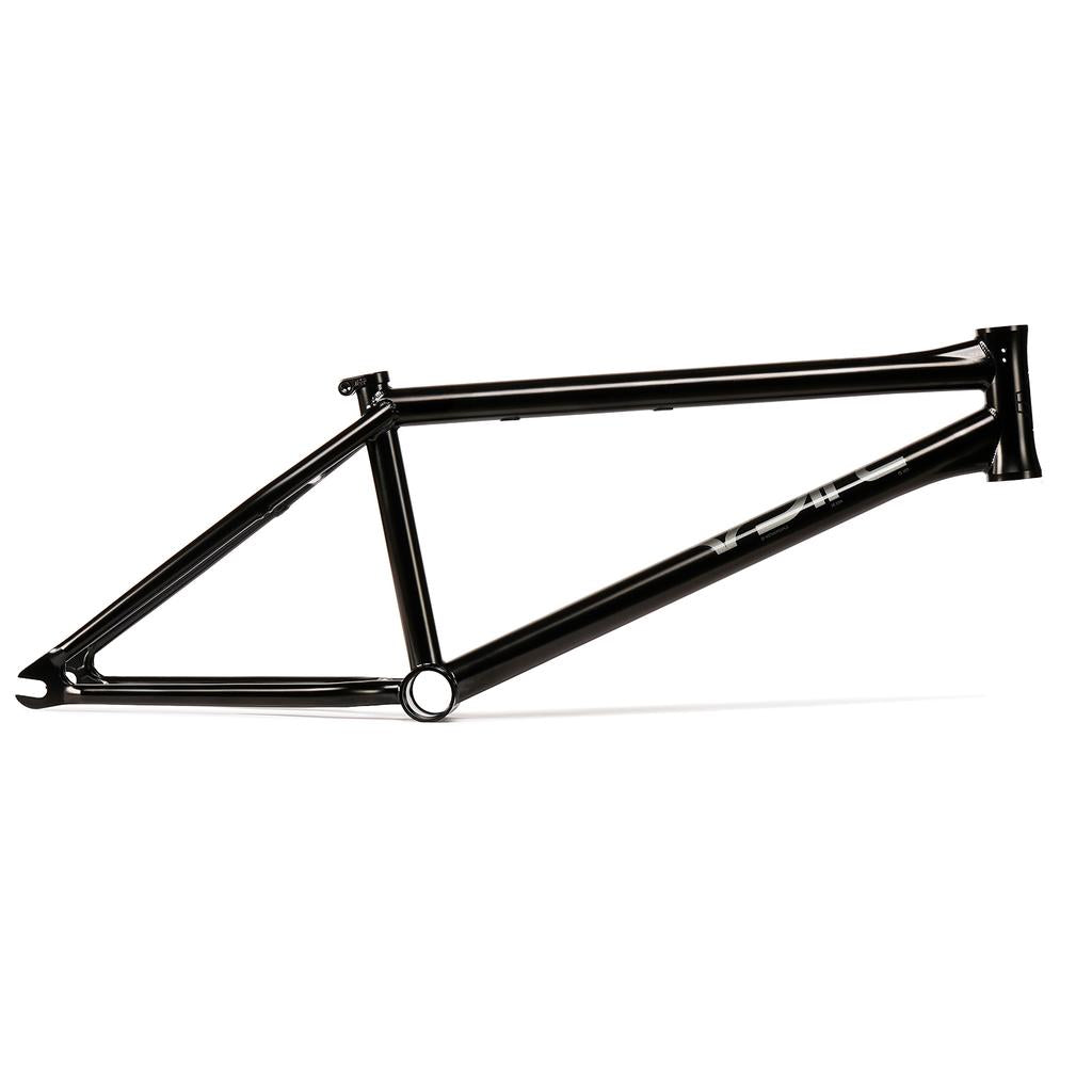 The Wethepeople ARC Frame (Murray Loubser) is shown from the side in matte black, highlighting its triangular hydroformed 4130 CrMo structure and responsive street geometry. Displayed without wheels, seat, or handlebars.