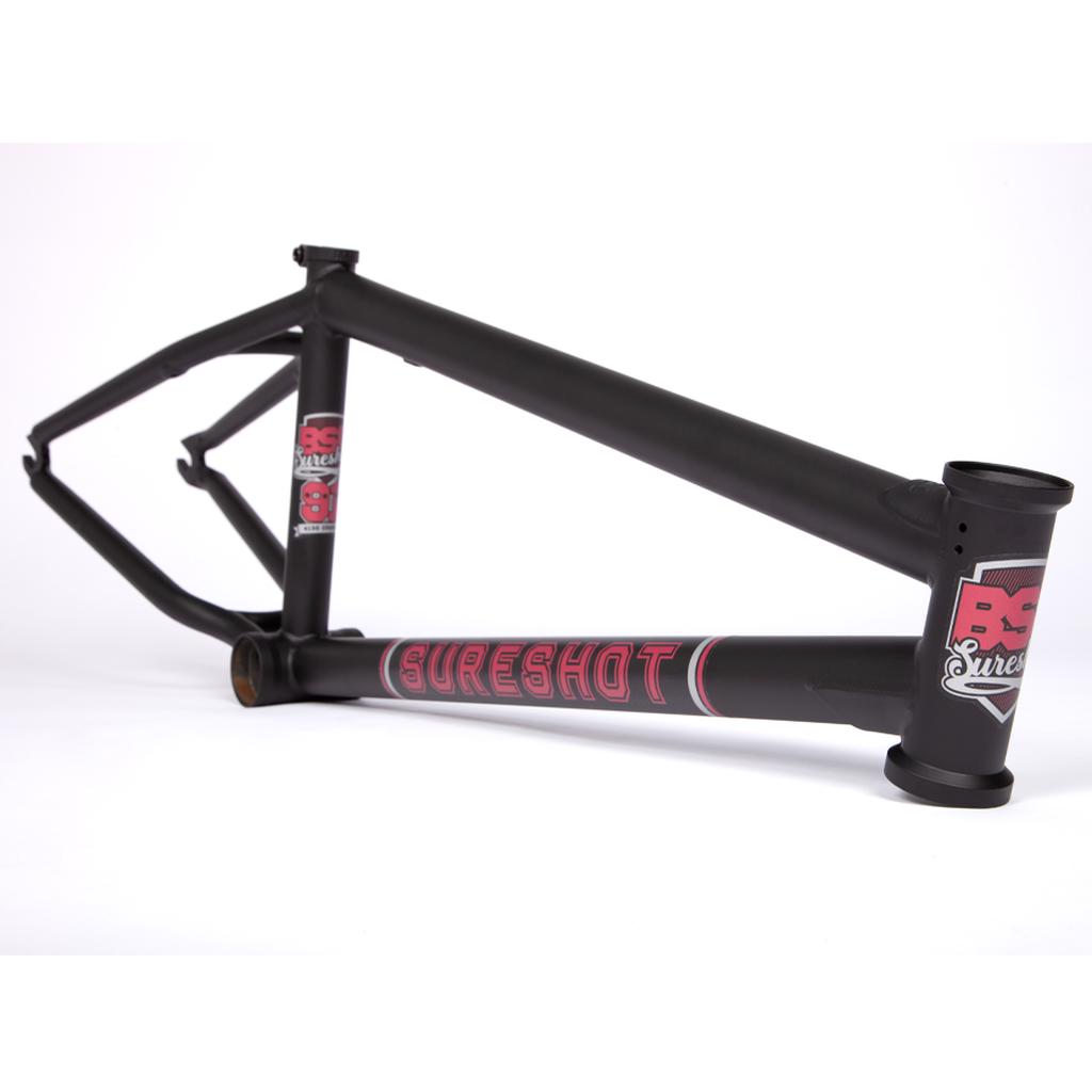 The BSD Sureshot Frame is a black all-round BMX frame with red and white accents and removable brake mounts, shown on a white background.