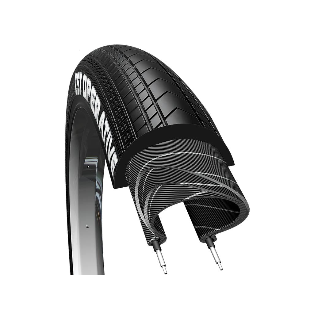 A cross-section of the CST Operative 20 Inch Tyre shows its inner layers and tread pattern for all-around performance. It has two valve stems, embossed text on the outer sidewall, and is engineered for impressive cornering grip, making it perfect for BMX.