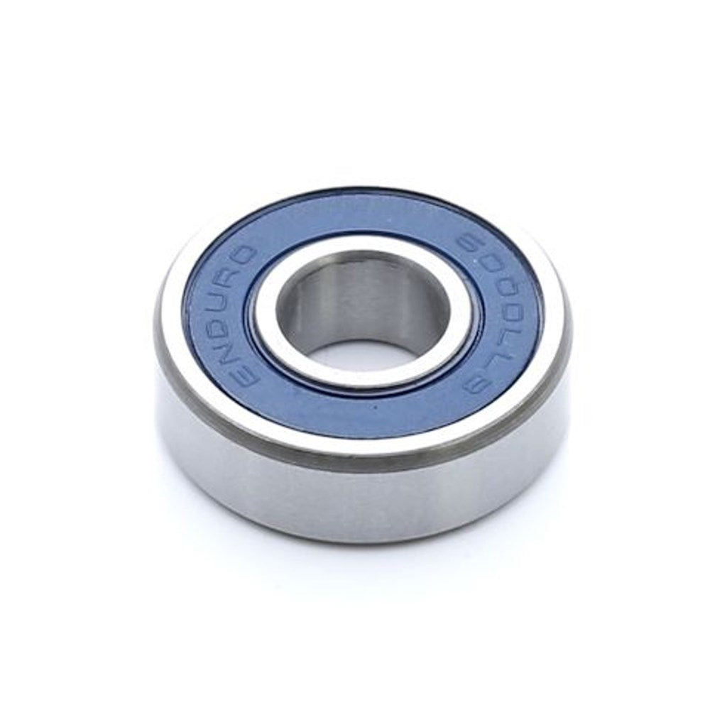 A metal ball bearing, the Enduro A3 LLB Sealed Bearing (each), featuring a blue seal and constructed from premium 52100 high carbon chromium steel for durability, is shown on a white background.