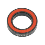 A black and red Enduro ZERO Ceramic Sealed Bearing with low rolling resistance on a white background.