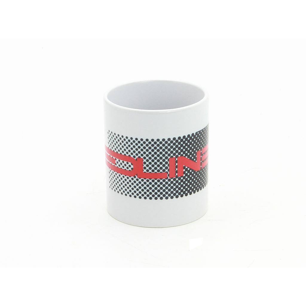 The Redline RL20II Coffee Mug is a 12oz white ceramic mug with a black and white dotted pattern and bold red “Redline” text partially visible across the center.