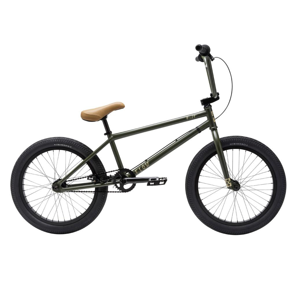 Fit Bike Co Flow 20 Inch BMX bike in olive green with tan seat, black handlebars, and thick tires; shown in profile on a white background—ideal for dirt jumps and your next biking adventure.
