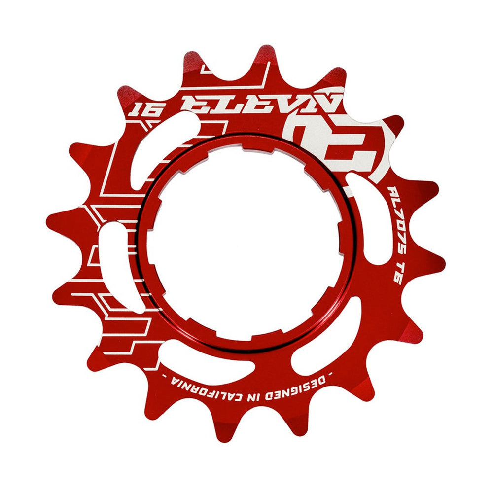Red anodized Elevn Alloy Cog 3/32 Shimano Comp bicycle cog with white branding text, isolated on a white background.