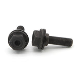 Two black Eclat Exile Bolt & Washer (Pair), reminiscent of exile hub bolts, are lying on a white surface; one is positioned vertically and the other horizontally.