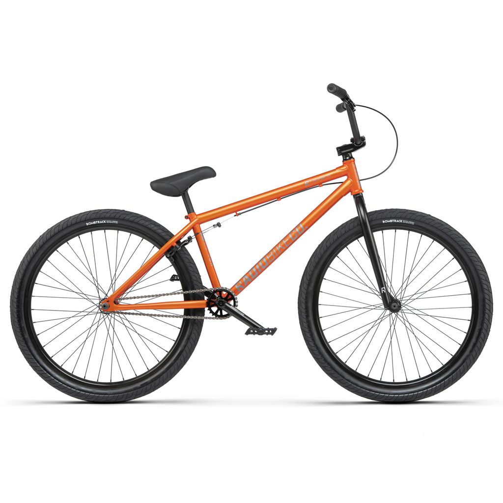 An orange Radio 26 Inch Ceptor Bike with black wheels, pedals, and handlebars is shown against a plain white background. The bike has a sturdy frame, sealed bearings for smooth operation, and is designed for performance and tricks.
