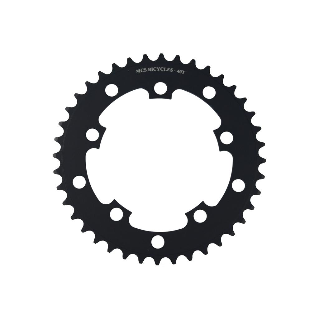 The MCS 110BCD 5 Bolt Chainring is a black metal, CNC machined BMX racing chainring with 40 teeth, multiple bolt holes, and "MCS BICYCLES - 40T" labeled at the top center.