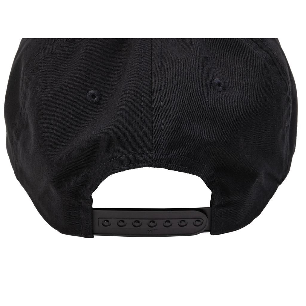 Close-up of the back of the black Sunday Blockhead Cap, showing its adjustable snapback strap and two ventilation eyelets.