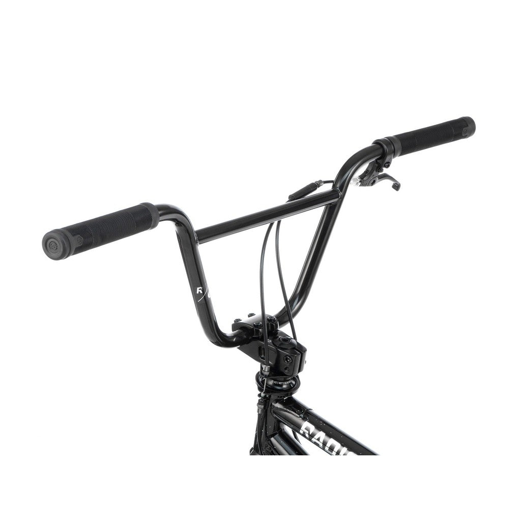 Close-up of the handlebars on a Radio Astron FS 20 Inch Bike, highlighting the grips, brake lever, and part of the full chromoly frame.