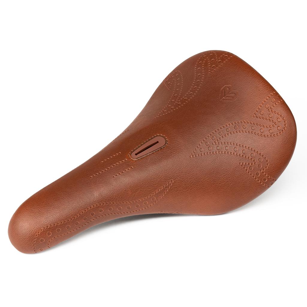 The Eclat Exile Pivotal Seat / Tyson is a brown leather BMX seat with decorative stitching and a small central cutout, shown from above on a white background. Its design offers both comfort and style for your ride.