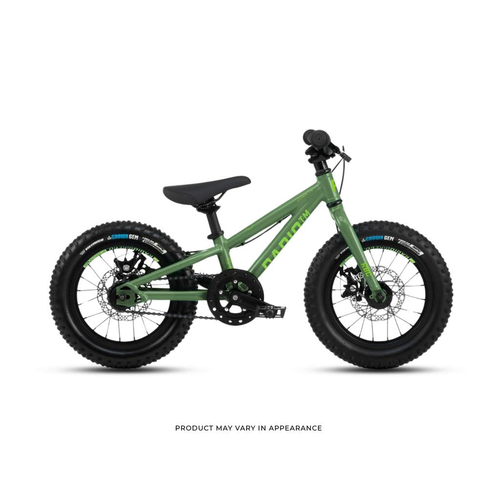The Radio Zuma 14 Inch Bike features thick black tires, a black seat, and flat handlebars. This lightweight kids’ mountain bike is shown on a white background. Note: Product appearance may vary.