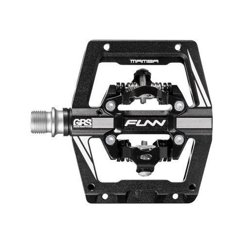 Close-up of the Funn Mamba S SPD Pedal, featuring a metal textured platform and central spring mechanism. Ideal for enduro racing, this pedal offers a symmetrical design with multiple attachment points, compatible with Shimano SPD systems.