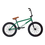 The Sunday Forecaster 20 Inch Bike (2022) / Alec Siemon features a green frame with a tan seat, black tires, and handlebars. Its 100% chromoly build prominently displays the "Sunday" brand name. This model also includes the Odyssey Clutch v2 Freecoaster for smooth riding.