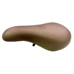 The Fit Barstool Pivotal Seat is a brown padded bicycle seat with a stitched emblem on top, featuring a contoured barstool design, displayed against a plain white background.