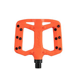 The FUNN Taipan S Junior Composite Flat Pedals feature an orange, glass fiber reinforced thermoplastic body with black grip pins and a metal axle for superior traction, shown against a white background.