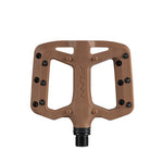 FUNN Taipan S Junior Composite Flat Pedals made of glass fiber reinforced thermoplastic with black pins for extra grip and a central spindle, shown top-down on a white background.