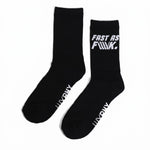 A pair of black LUXBMX FAF Race Crew Socks, featuring "FAST AS F\*\*K." on the upper side of one sock and "UNDRPLY" on the toes of both. These durable socks are ideal for BMX race sessions or everyday wear.