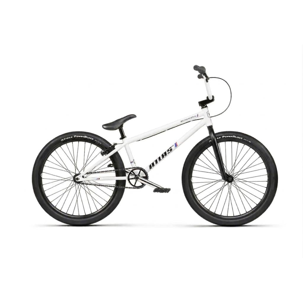 The Wethepeople Atlas 24 Inch Bike is shown in profile on a plain white background. It features a white frame, black tires, seat, and handlebars, as well as Odyssey R32 forks.
