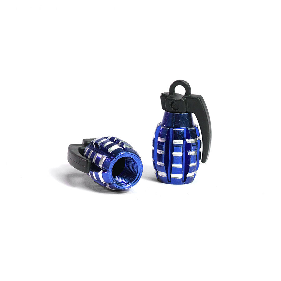A pair of small, blue and silver Grenade Valve Caps—one upright, one on its side showing the Schrader valve threaded opening.