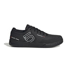 A Five Ten Freerider Pro Flat Core Shoe in black with white logo, shown side profile on a plain white background, designed for superior pedal-gripping control.
