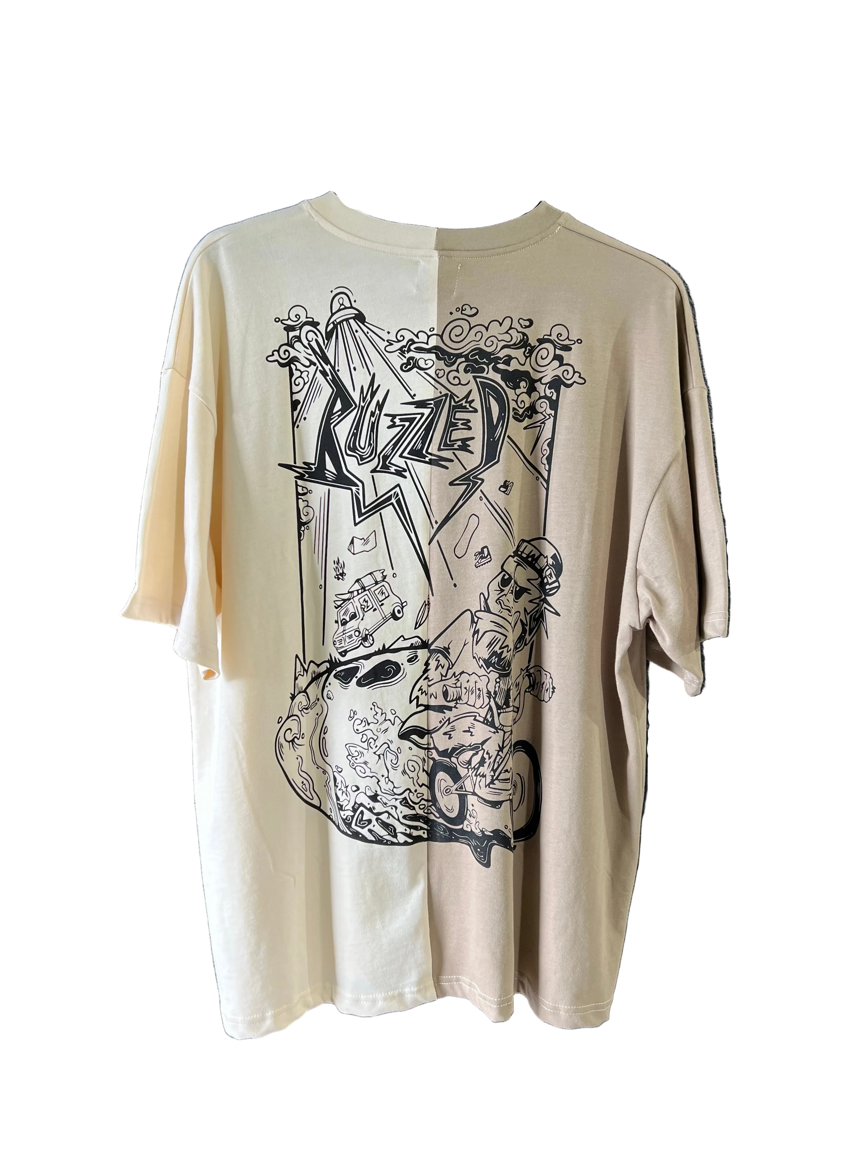 The Buzzed Riders Split Tee is a beige short-sleeve shirt featuring a bold black and white graffiti-style graphic with cartoon-inspired imagery on the front—an action sport-inspired piece guaranteed to spark conversation.