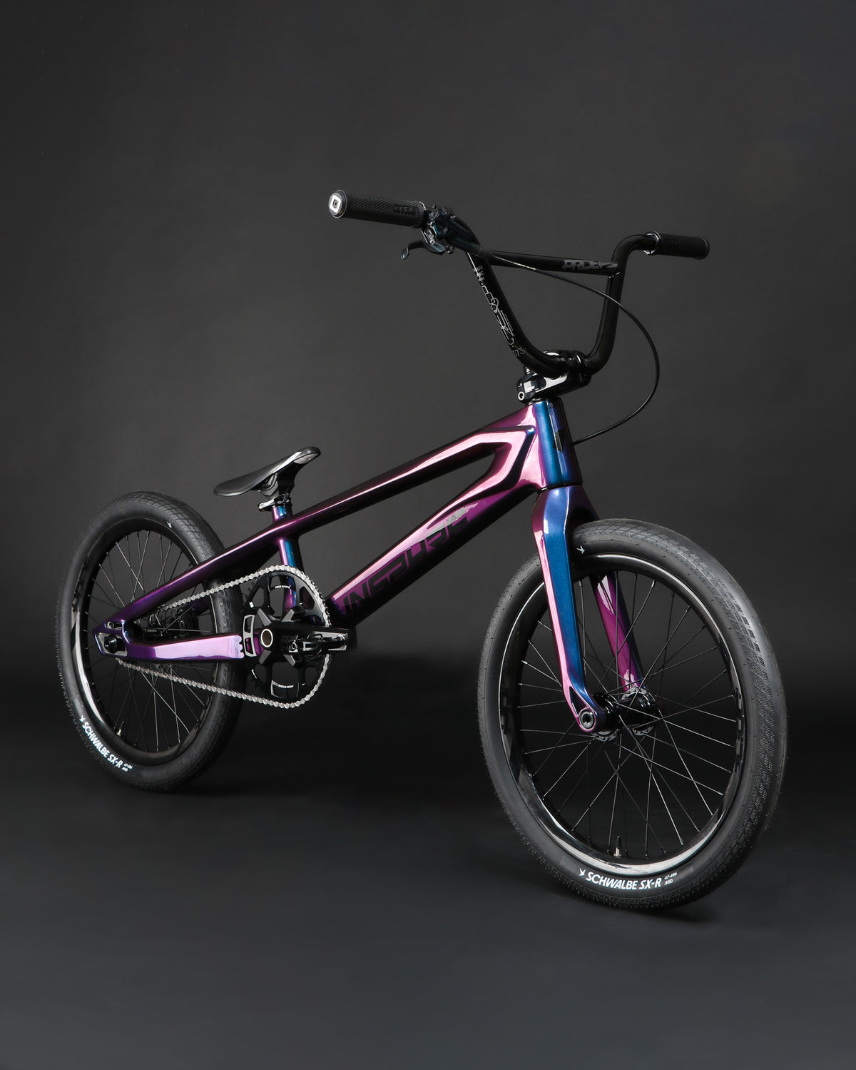 Inspyre Era Pro XXXXL Frameset in iridescent purple and blue with black components and treaded tires.
