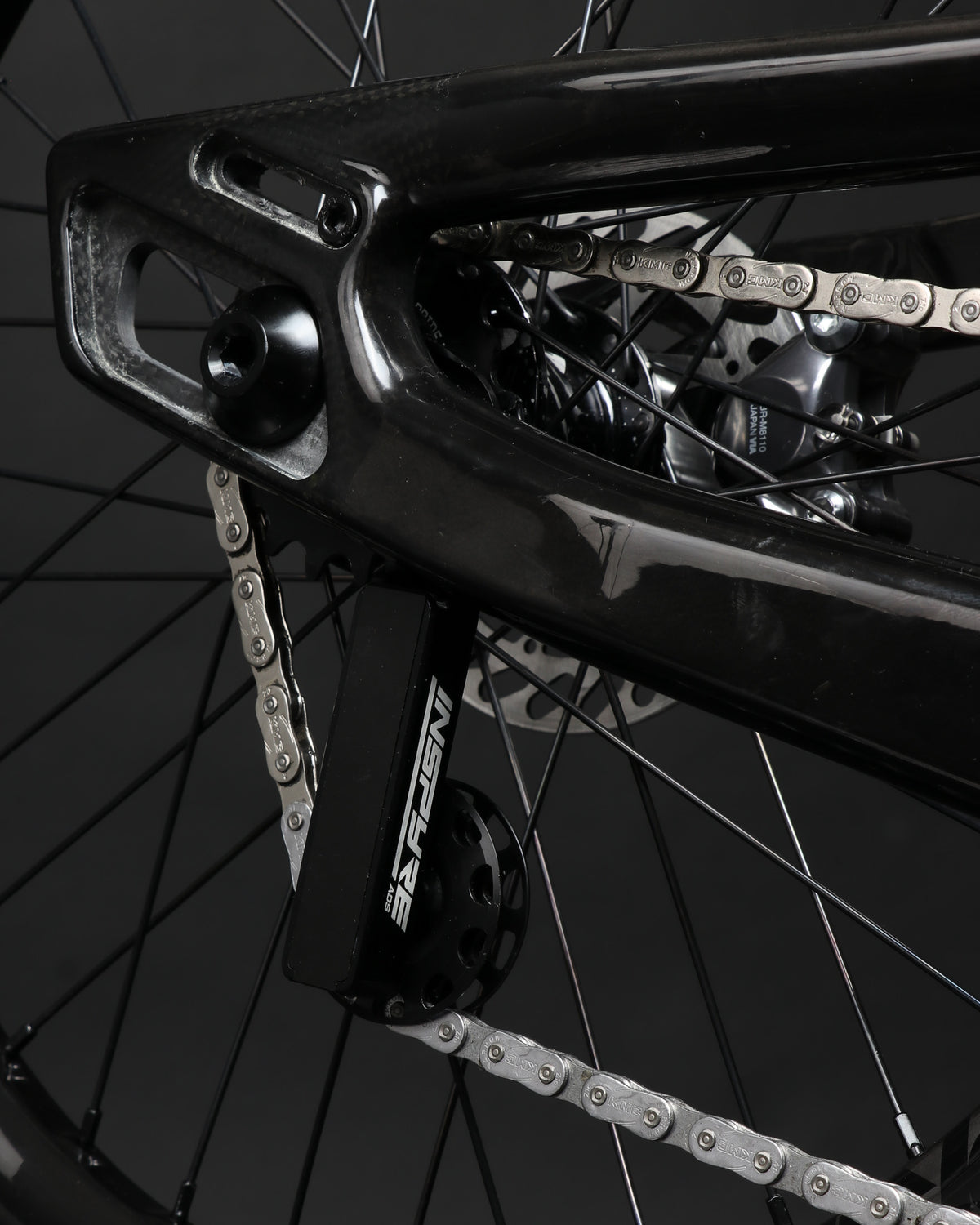 Inspyre Concorde V3 ADS Tensioner mounted to a sliding dropout on a bike frame.