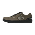 Side view of Five Ten Freerider Pro Flat Core Shoes in CRDBRD/OFF WHT/CORE, featuring brown and black colors, pedal-gripping control, black laces, and a white logo.
