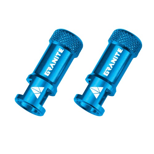 A pair of Granite Juicy CNC Presta Valve Caps with valve core remover, featuring blue metallic finish and “GRANITE” branding, are displayed side by side on a white background—an essential accessory for any cycling enthusiast.