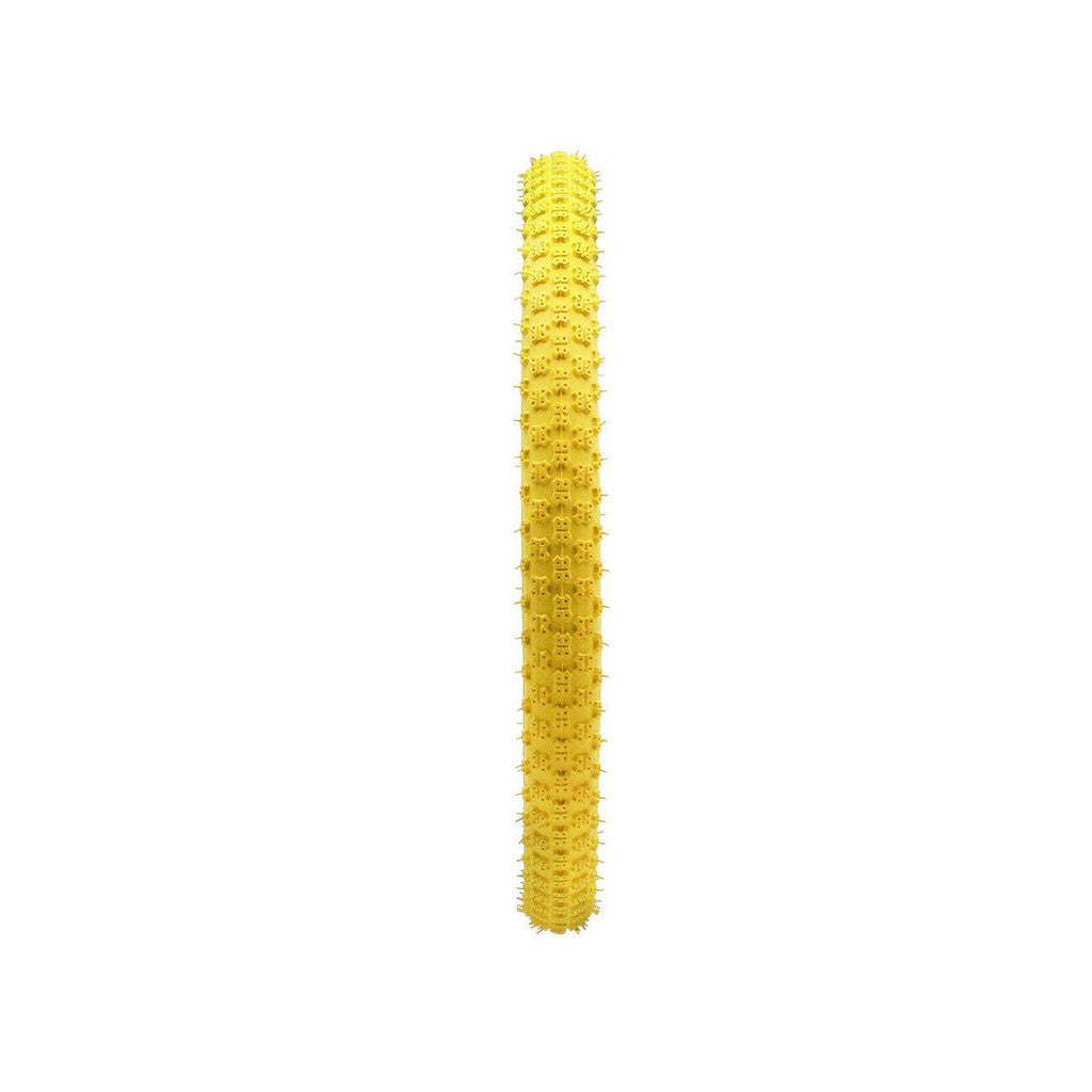 Single piece of yellow fusilli pasta isolated on a white background with a Kenda K50 Tyre tread design.