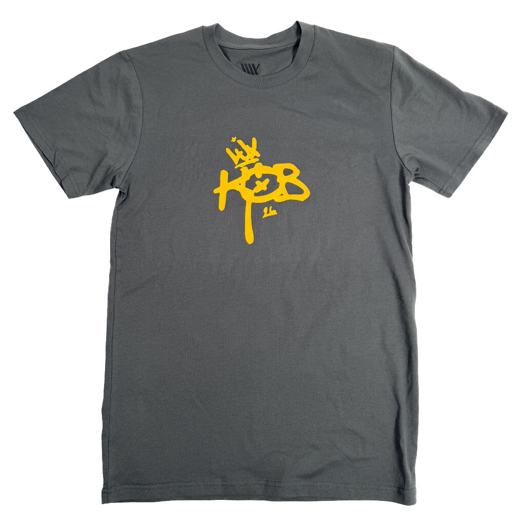 Rock the LUXBMX King of BNE 2026 T-Shirt Dark Grey / Yellow—yellow graffiti “HOB” logo, crown graphic, and King of BNE style for the 2026 King’s Birthday.