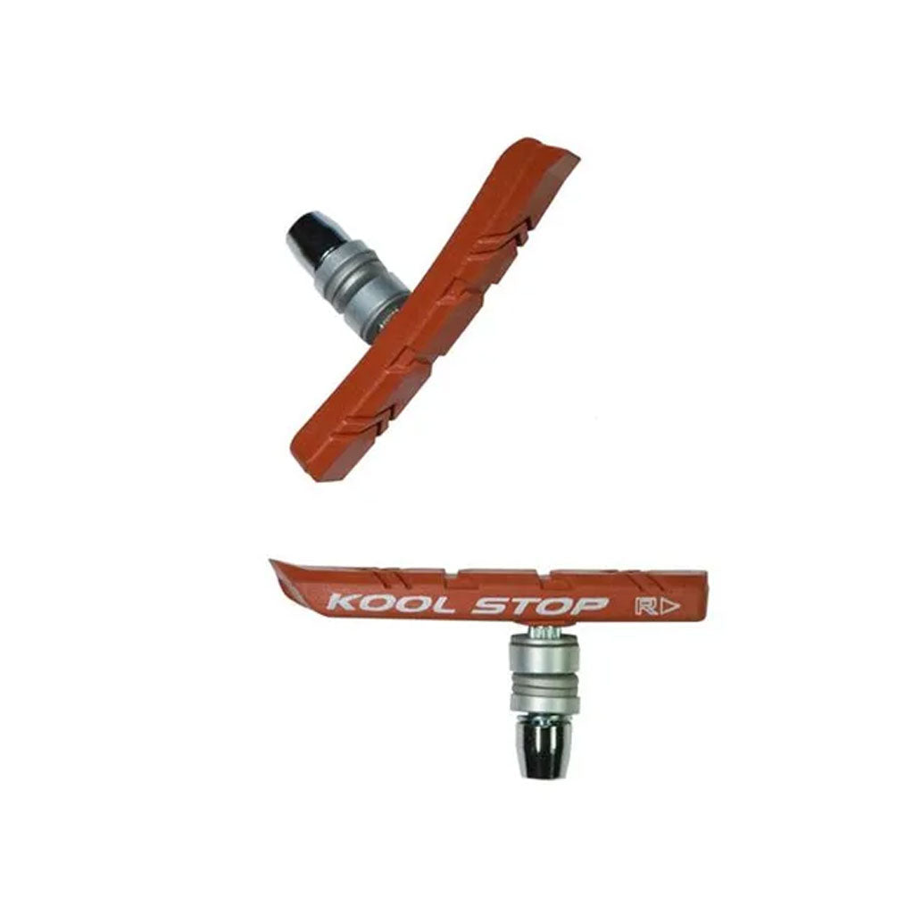 A pair of Kool Stop BMX Brake Pads featuring red rubber pads and metal attachments, displayed against a white background.