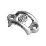 The Magura MT-C Clamp is a silver metal replacement clamp featuring two screw holes and a central raised section for securing brake levers, shown from above against a white background.