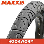 Close-up of the Maxxis Hookworm 20 Inch Tyre, showcasing its durable tread and urban-ready design, with "MAXXIS" above and "HOOKWORM" below this popular bicycle tire.