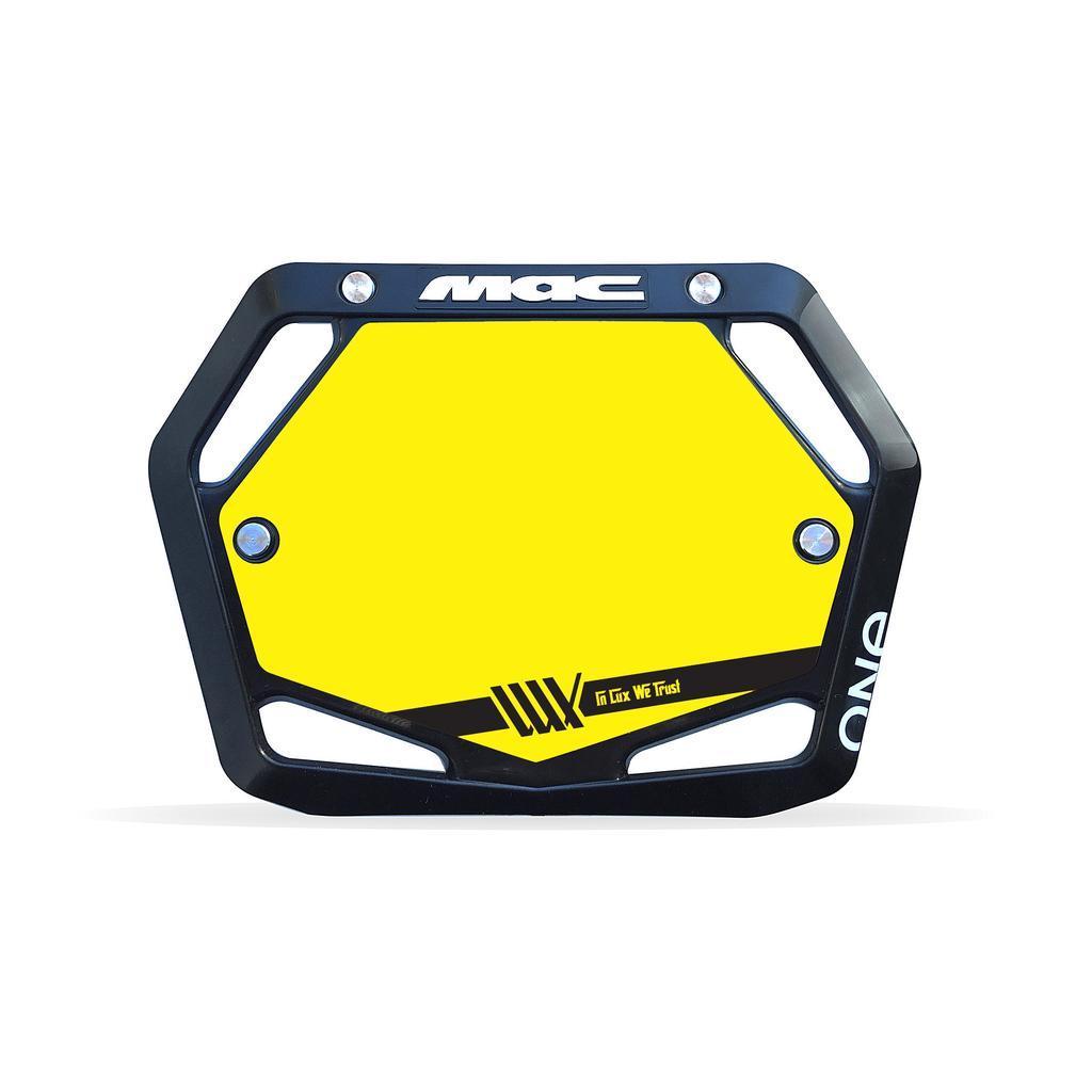 The Mac Components Junior Plate Insert is a black and yellow cycling number plate with "MAC" at the top, "ONE" on the side, a stylized graphic, and "Go n’ W’ Fast" at the bottom right—ideal for UCI race rules.