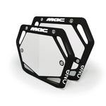 Two black and white Mac Components Pro Plate metal license plate frames with “MAC” and “ONE” text, stacked with slight overlap—ideal for BMX fans or anyone who loves top Aussie brand style.